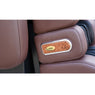 Close-up of the brown leather footrest with wood-accent Luraco badge on the i9 Max Plus massage chair – photo 9