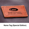 Close-up of the embossed Luraco leather name tag on the Special Edition i9 Max Plus massage chair – photo 11